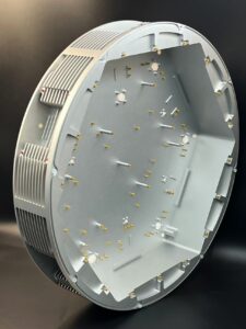 JADE-CNC sample-library photo of a large CNC machined plate with pockets, dziury, and machined setup features